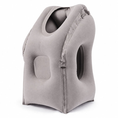 Light grey inflatable travel sleep pillow with face opening and side arm opening