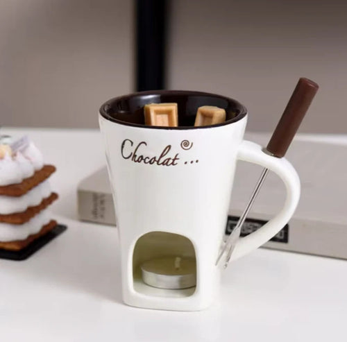 Beige ceramic FondPot chocolate fondue cup with candle holder and dipping utensil