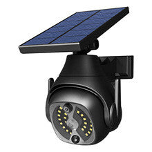 Black GlowJay solar motion light with rotating blue solar panel