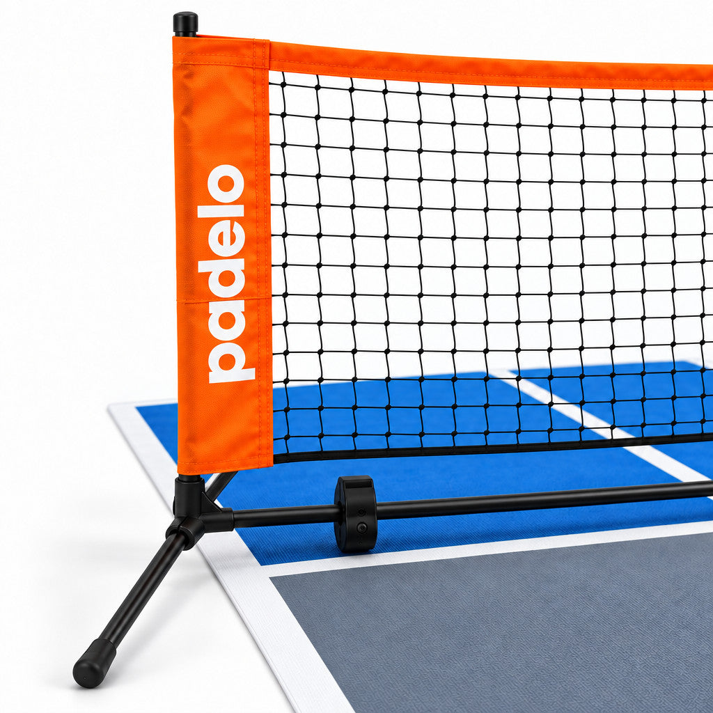 Close-up of orange portable pickleball net frame
