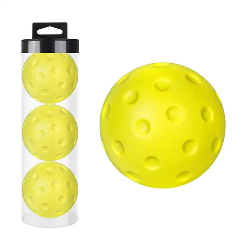 Yellow pickleballs in a clear storage tube